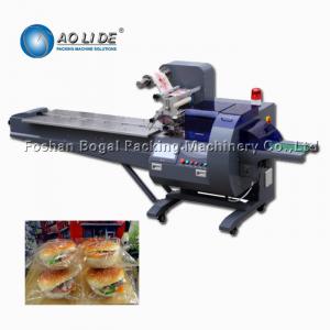 China Rotary type pillow disposable plastic tray walnut dried meat floss cup cake wrapper sealing packaging machine on sale 