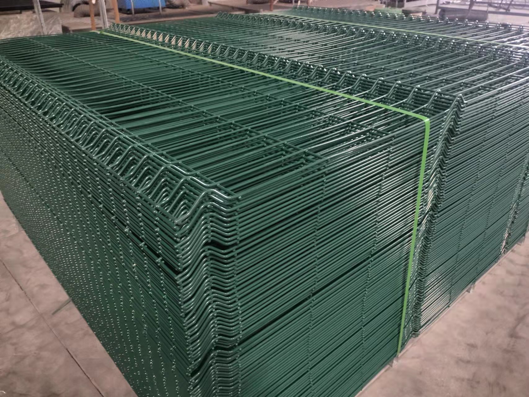 green colored curved mesh fence panels