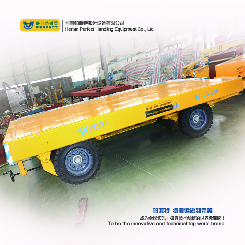 custom 1-200 ton heavy duty industrial trailer towed by forklift free turning trackless transfer trailer 