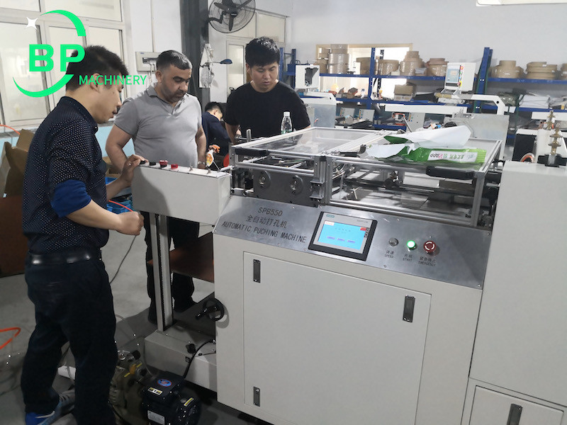 Turkey customer inspect automatic wire o spiral notebook and calendar punching machine 