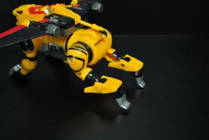 yellow dinosaur transformer