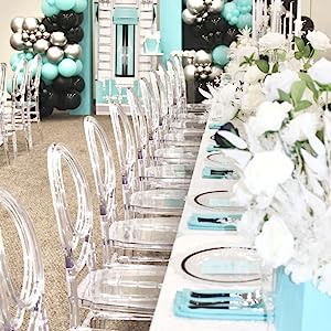 customer display of clear chairs at an event banquet