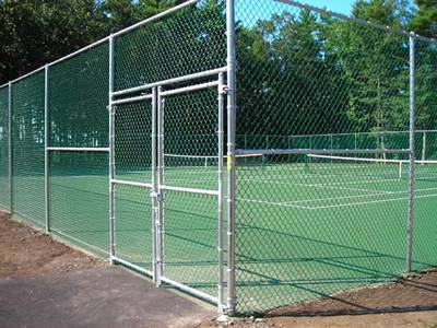 Galvanized chain link tennis courts fence.