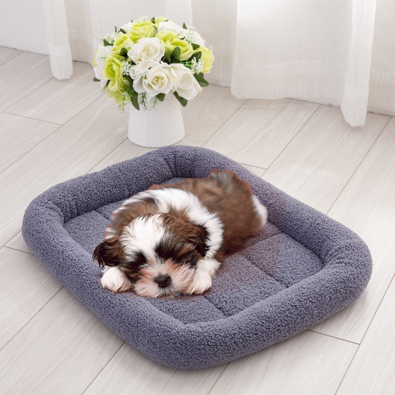 grey fluffy dog bed