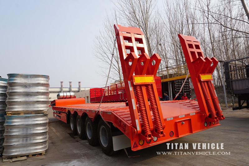 4 axles low bed trailer 100 ton have high quality and the loe bed semi trailer will send to customer