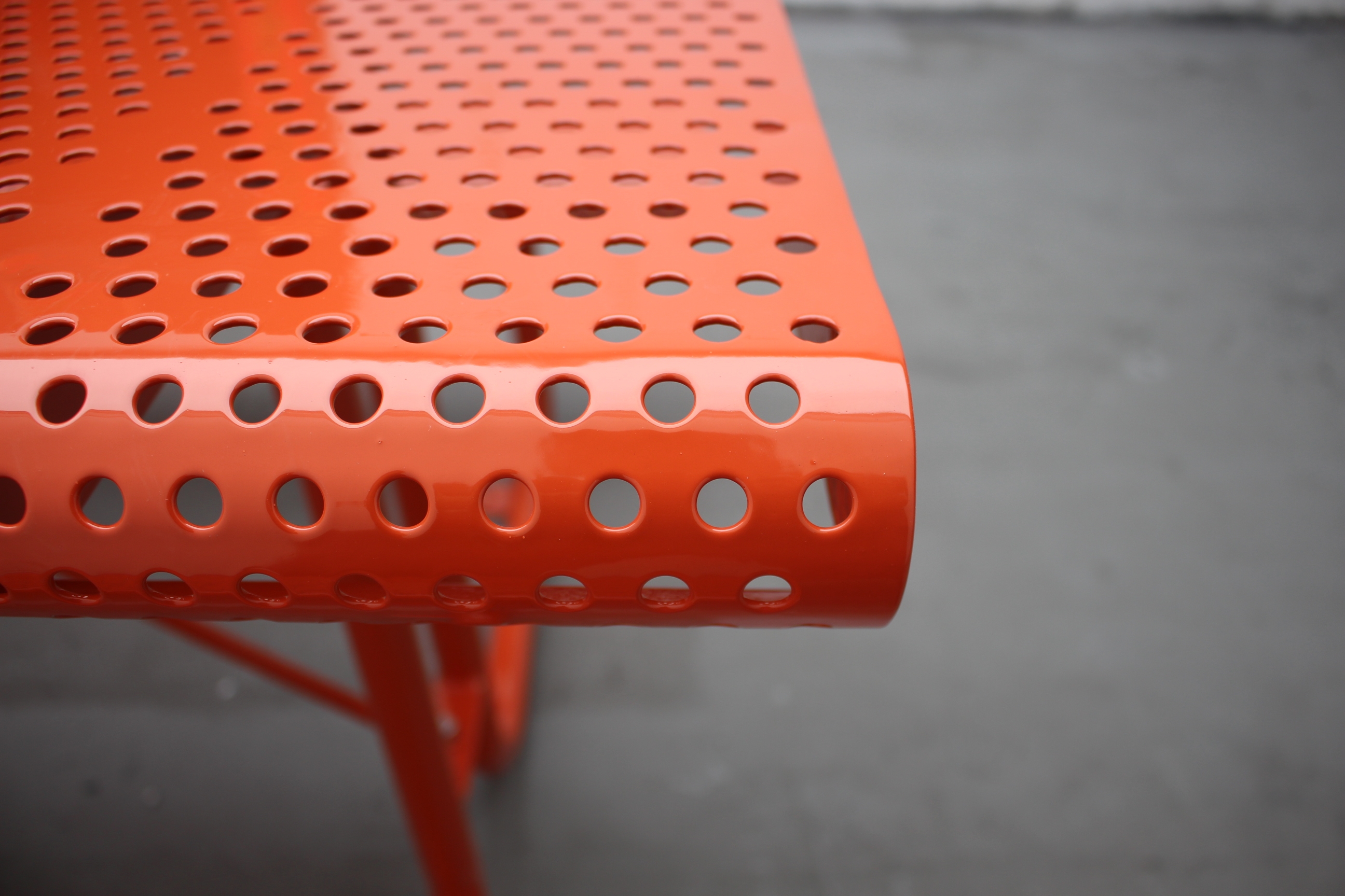 mild steel picnic table, perforated steel table top and seat pans,one table with two benches,surface mounted