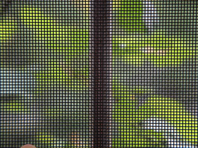 A sheet of black window screen gives a clear vision for outside scenery.