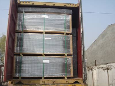 2D fence panels were packed in pallets and enveloped by plastic film stored in freight car waiting for delivery.