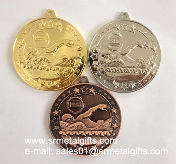 gold metal swimmer medals