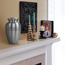 Pewter Adult Urn on Mantle in a house
