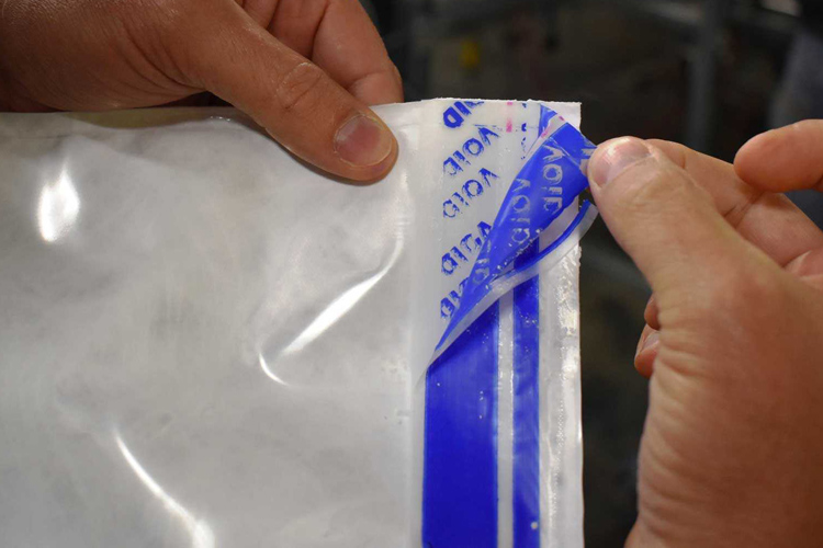 Tamper Evident Deposit Bag with Heat Sensitive Security Seal