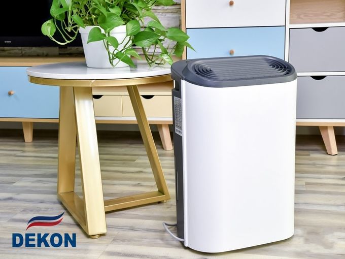 DKD-Z12A 12L touch control panel new designed home portable dehumidifier with universal wheels