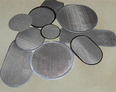 Many filter disc with different wrapping material and sizes.