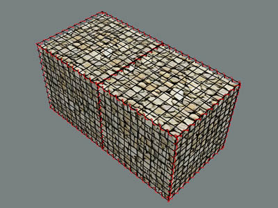 A completed welded gabion filled with stones on the ground.