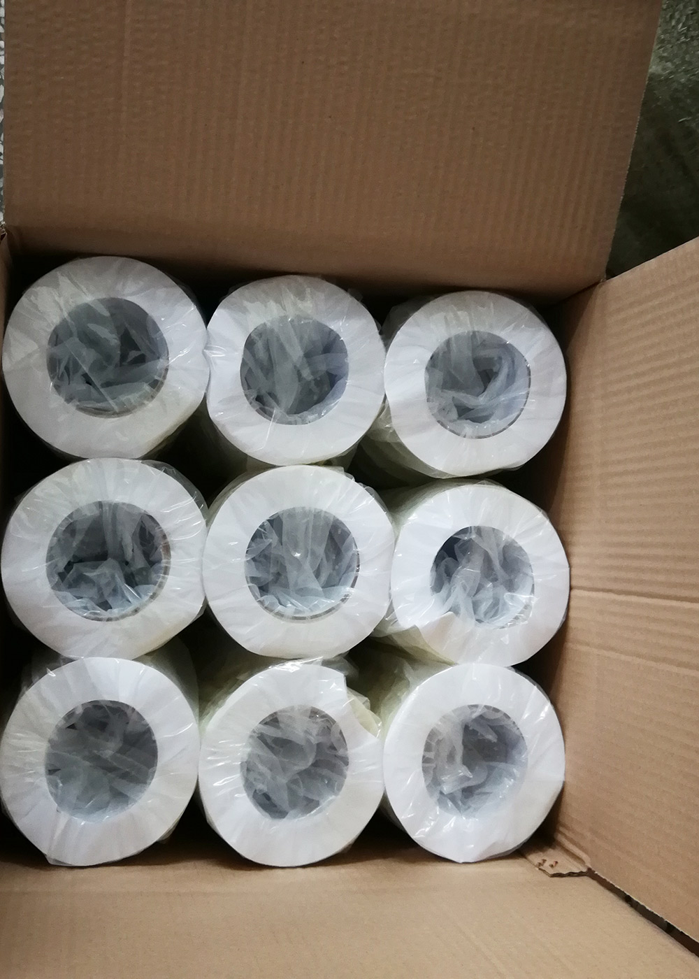 Package of bi-directional filament tape
