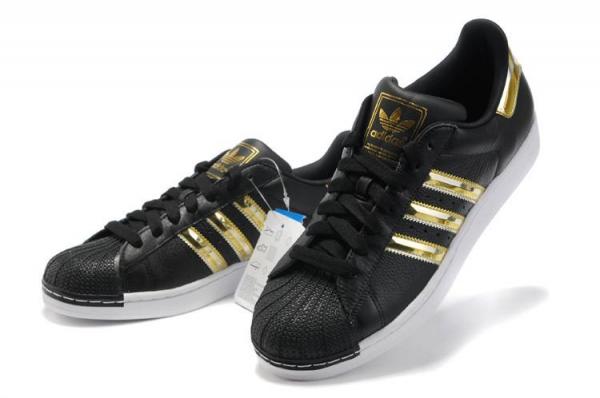adidas black with gold stripes