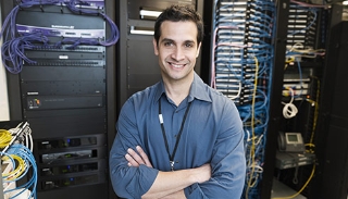 IT professional standing at a Server Room