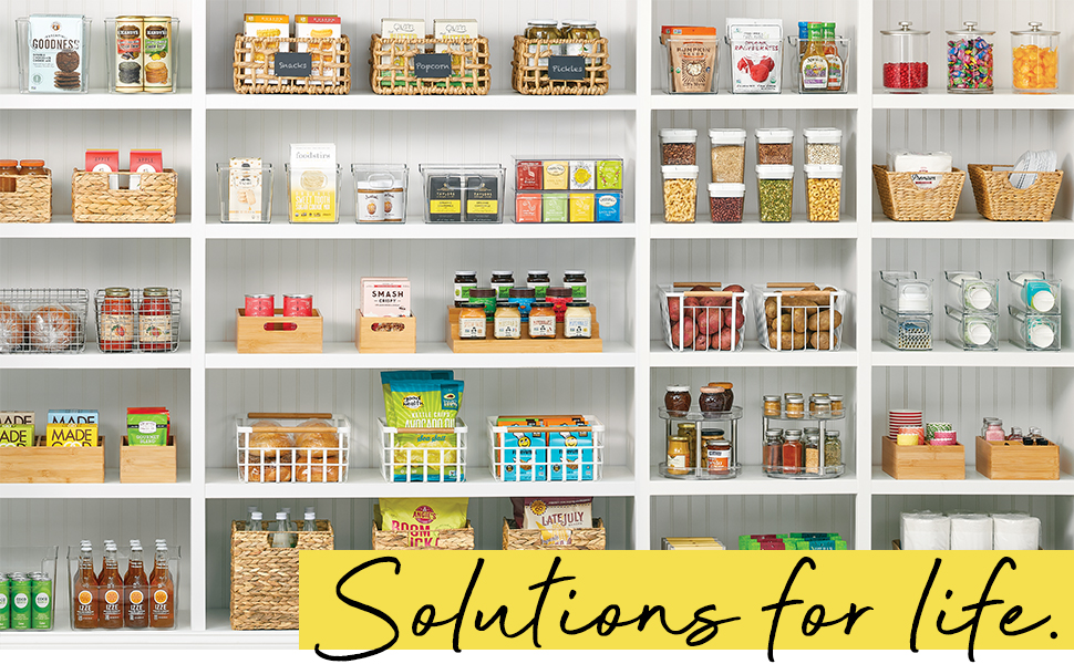 Solutions for Life Heading, antry setting, white shelves, bins, baskets holding organized food items