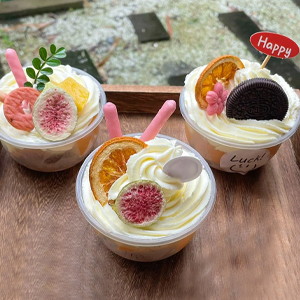 ice cream cups with spoons
