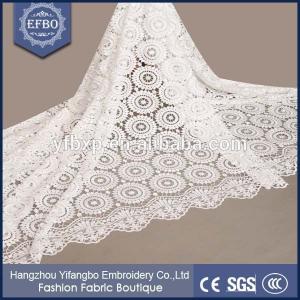 China 100 Polyester nigeran lace materials white lace fabrics switzerland with many rhinestones supplier