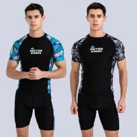 China Sports 2 Piece Mens Swimsuit Skin Friendly Printing Stitching Two Piece Swimsuit For Men on sale