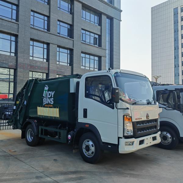 Sinotruck Howo Right Hand dumpster Robust Compactor Garbage Truck