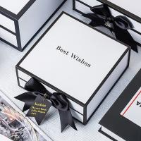 China Rigid White Magnetic Cardboard Gift Boxes With Black Rim And Ribbon Bow on sale