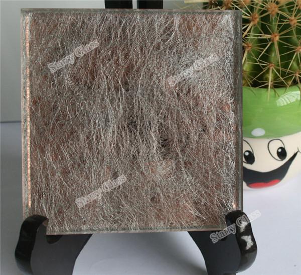 Laminated Glass with Fabric Interlayer