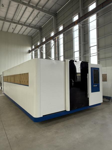 High Precision Exchange Table Laser Cutting Machine for ±0.02mm Repositioning Accuracy and AC380V/50Hz/60Hz Power Supply