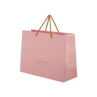 China Multipurpose Pink Custom Paper Shopping Bags With Plastic Clip Handle on sale