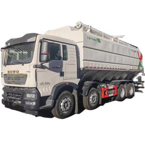 China HOWO Small Three-axis Bulk Feed Truck 25 Tons 32 Cubic Cubic Extruded Particles Transport wholesale