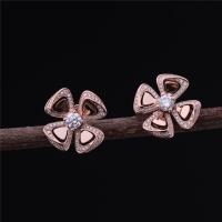 China Real Gold High Jewelry Fiorever Earrings in 18 kt Rose Gold Earrings set with two central diamonds and pavé diamonds on sale