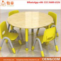 China Day Care Centre High Quality 4 Seats Round Wood Table and Plastic Chairs for 2-5 years old kids on sale