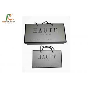 China Luxury Paper Shopping Custom Printed Bags For Clothing Packaging Rope Handle supplier