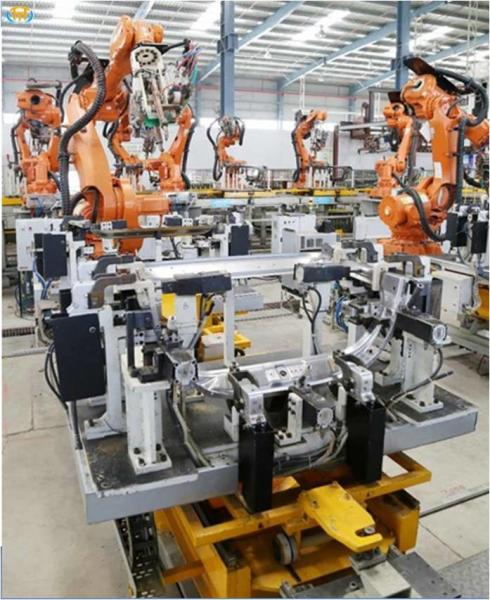 Spot Robotic Welding Systems With Fixture Switching Device Advantage For