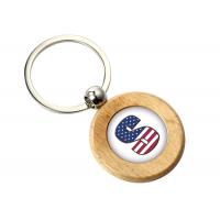 China Epoxy Doming Round Cute Metal Keychain 9mm Thickness Plain Wooden Keychain on sale