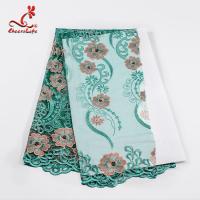 China Luxuriant Embroidery Stones Floral Lace Fabric For Fashion Clothing on sale