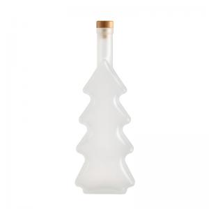 China 500ml Christmas Tree Shape Frosted Glass Bottles for Wine Vodka Beverage and Design supplier