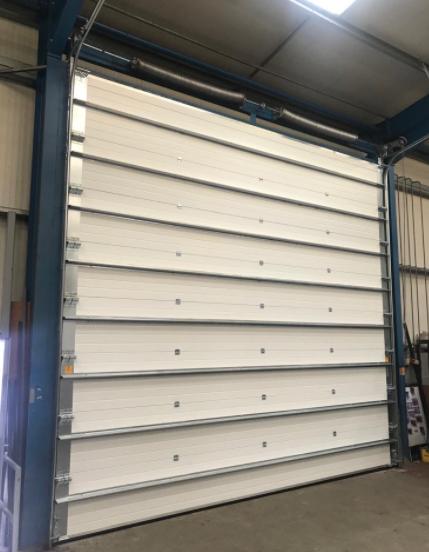 High Security Lock Fire Station Industrial Sectional Doors with Automatic Formed and Emergency Release Fireproof Rolling Shutter Door Exporters