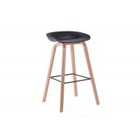 China Hollowed Backrest Black Tall Bar Stools 75cm Leather Bar Stools With Wooden Legs on sale