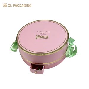 China XL Emballage Boîtes cosmétiques imprimées sur mesure Boîtes de luxe sur mesure en gros Boîte de papier cosmétique ronde avec un design unique Mini tiroir Boîte à ruban vert Poignée et plateau en or Pour les produits de beauté essentiels wholesale