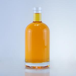 China Customized logo and cap 750ml glass liquor bottle for rum gin vodka Custom cork top supplier