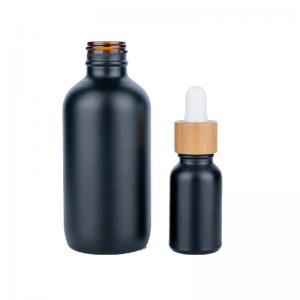 China Round Matte Black Cosmetic Dropper Bottles For Essential Oil 28.9mm supplier