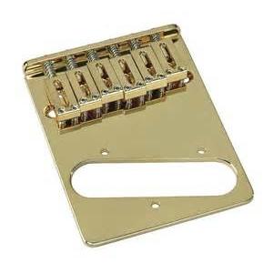 china CNC Machined Parts of Gold Plated Bass Bridge Plate for Guitar Fittings manufacturer