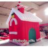 China 2.5m Red Inflatable Christmas Cottage with Santa on Chimney for Christmas Supplies wholesale