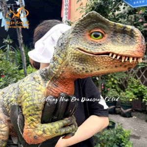 China Tamaño personalizado Bebé Dinosaurio Muñeco de mano verde T Rex para espectáculo de escenario y jardín wholesale