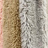 China Versatile 100% Polyester Artificial Long Curly Fur Fabric for Garments in Any Color on sale