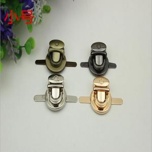 China Gold lock metal bag buckle button zinc alloy push lock for bags supplier