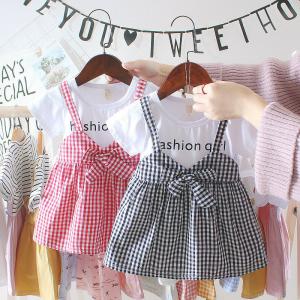China Black White Plaid Children'S Dress Clothing Round Neck Short Sleeve Dress With Bowknot supplier