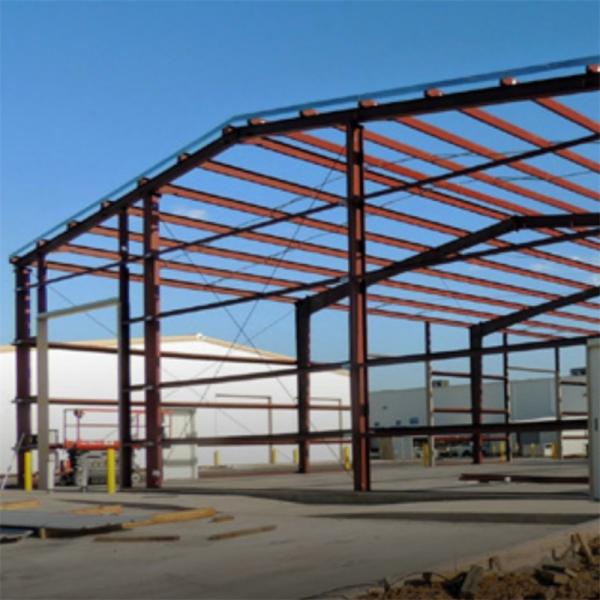 Metal Warehouse With Q355B/ Q235B Steel And Space Saving Roller Shutter Doors